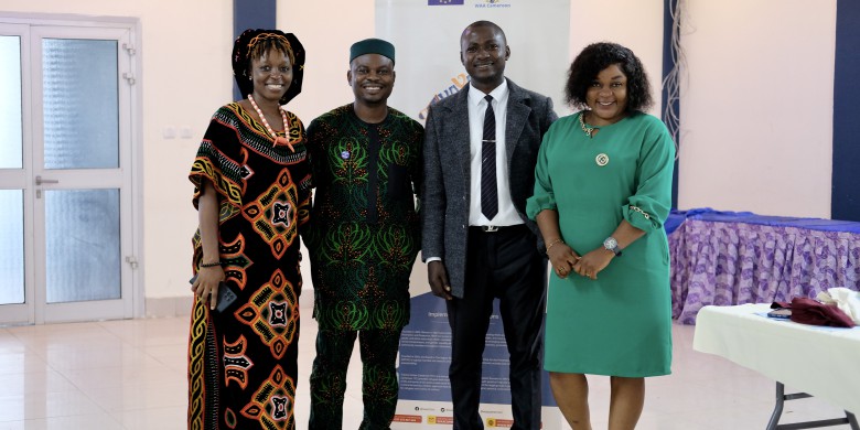 Photo of Geogette, Lawal, Peacebuilding Consultant and Facilitator Ntui Oben Obi, and Alemji Eballe of WAA Cameroon.