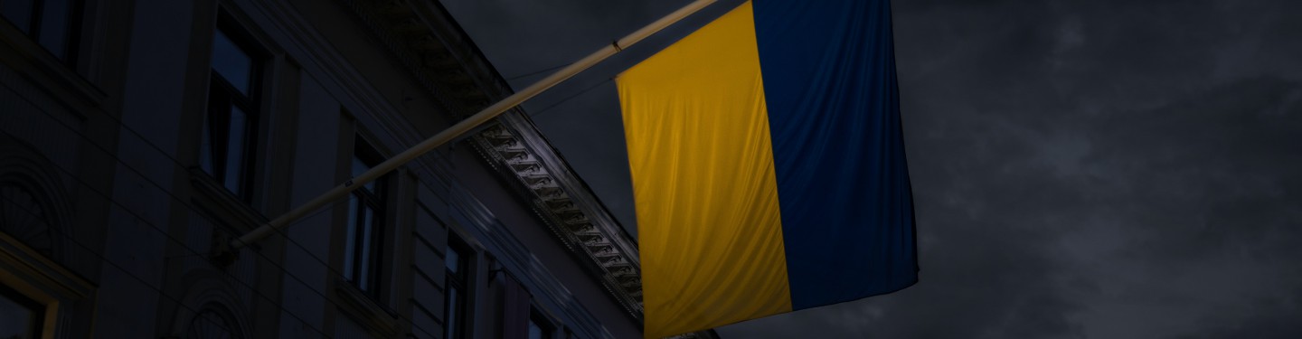 Ukrainian flag in front of a building