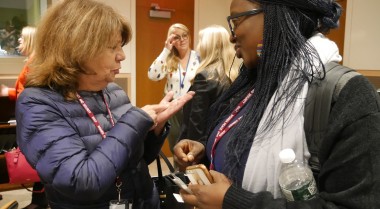 Two woman talking together at the UN