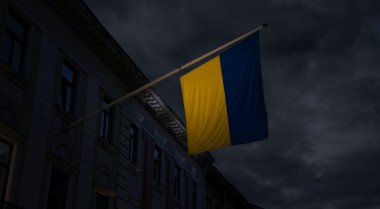 Ukrainian flag in front of a building