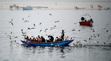 People sitting on a boat in India